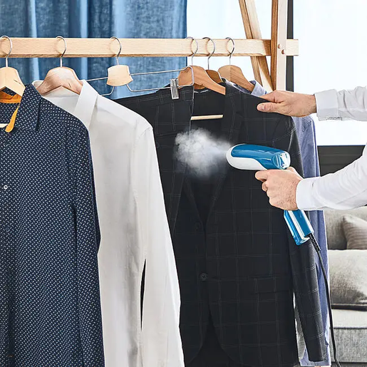 TEFAL vertikalna pegla na paru DT6130E0