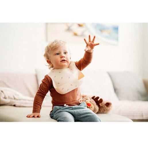 Petite&Mars silikonski podbradak, Beige Dandelion