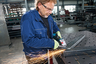 BOSCH Professional GWS 18V-10 (115 mm) akumulatorska kutna brusilica (brushless), solo alat u kartonu
