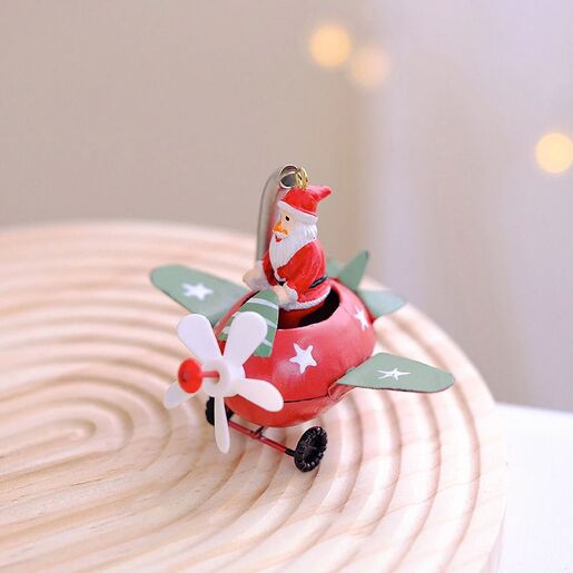 Novogodišnji ukras za jelku deda mraz u avionu EL crveni