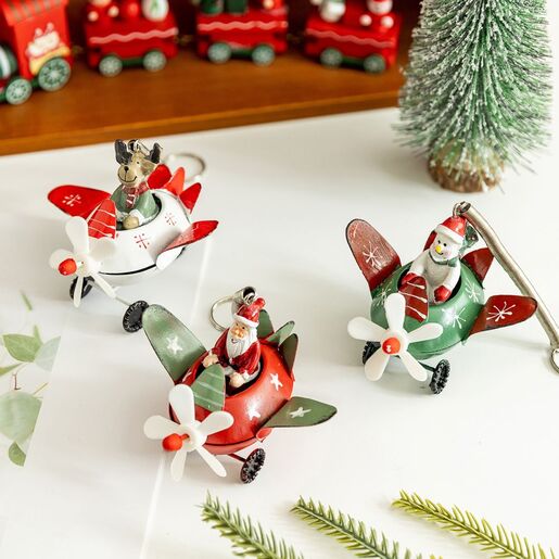 Novogodišnji ukras za jelku deda mraz u avionu EL crveni